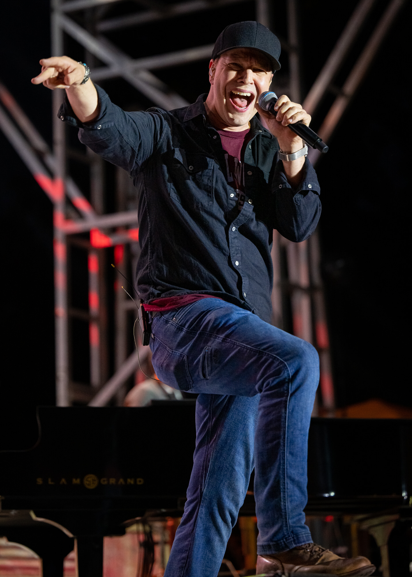 Lead singer pointing to the crowd