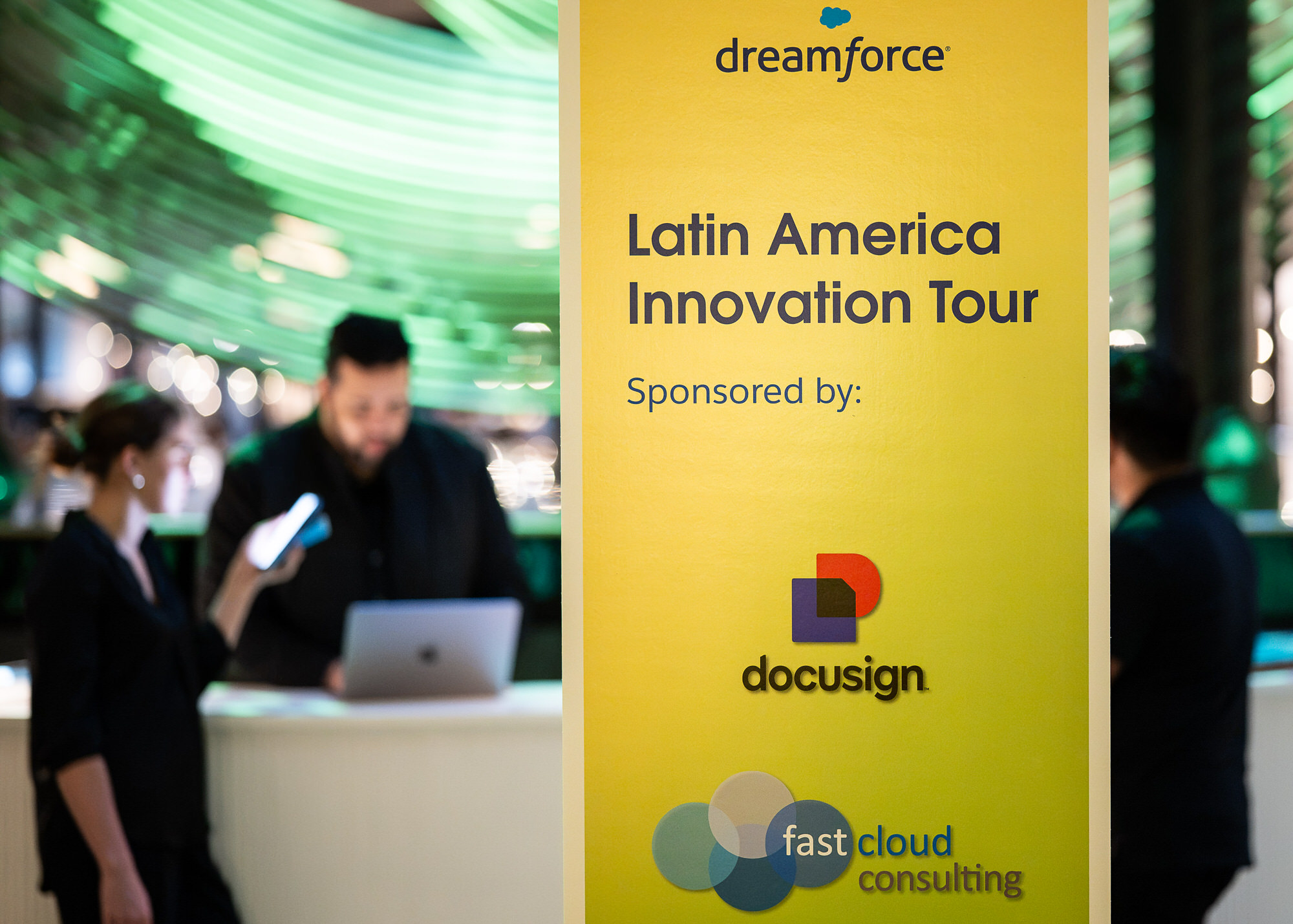 Sponsor sign at the entrance to an event check-in area